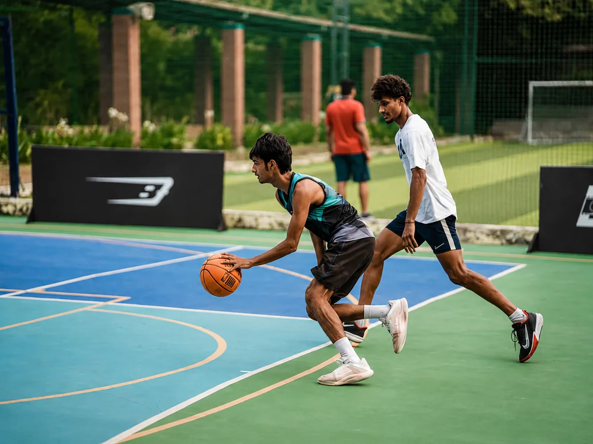 Baseline students applying basketball skills during an academy session